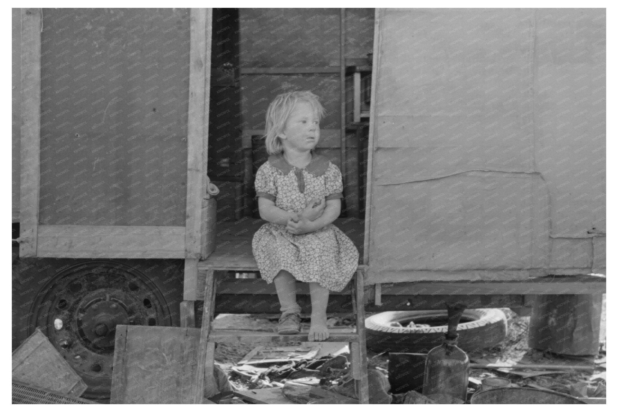 Migrant Child in Trailer Doorway Edinburg Texas 1939 - Available at KNOWOL