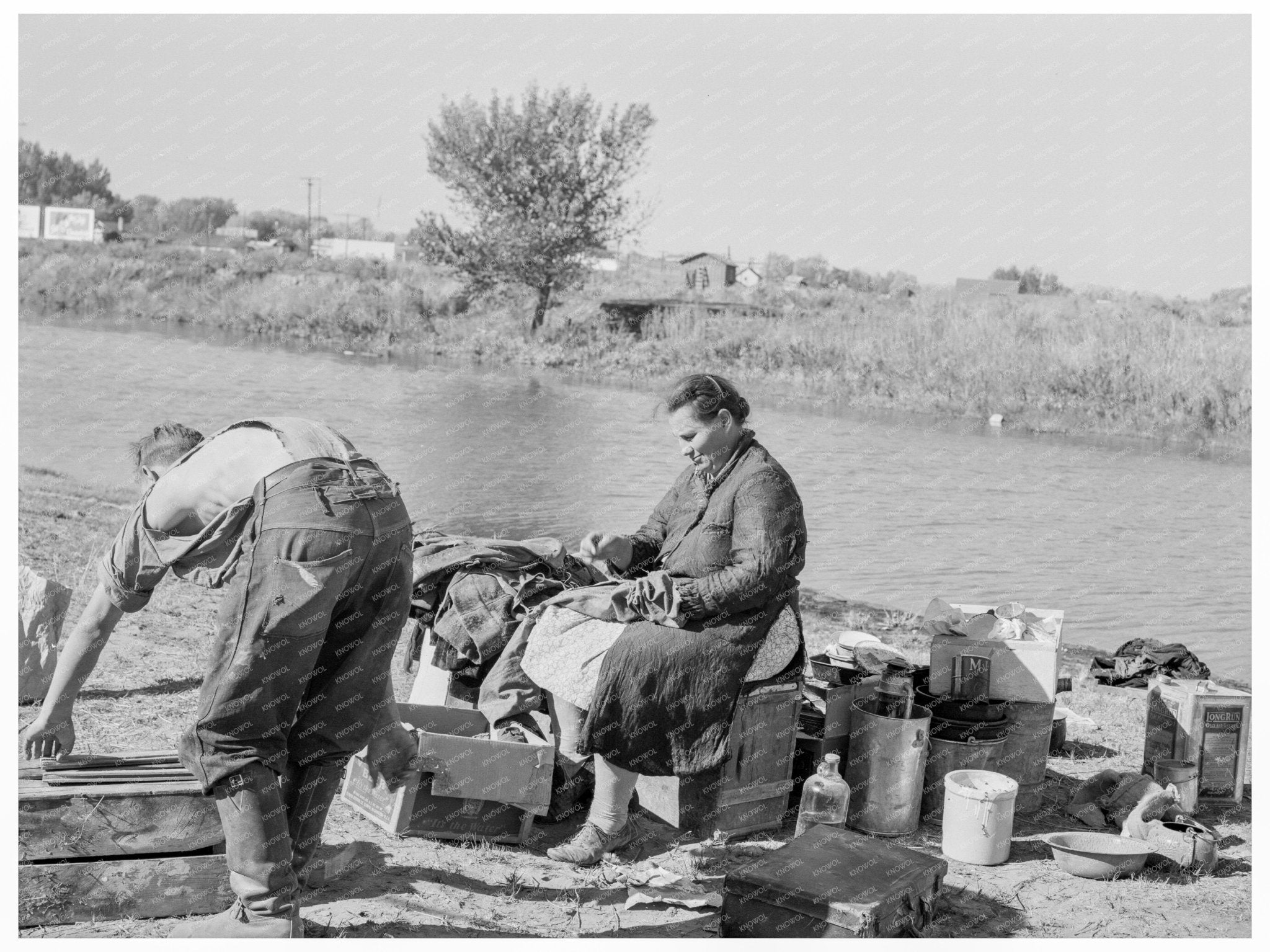 Migrant Family Cleaning in Oregon 1939 - Available at KNOWOL