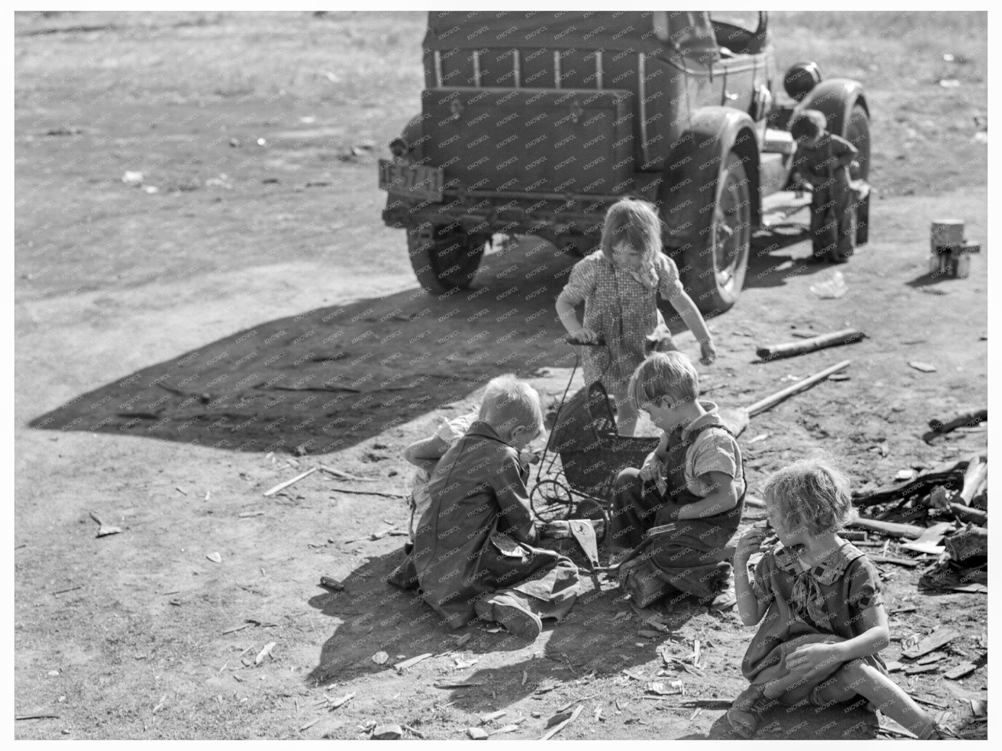 Migrant Family Picking Cotton Fresno California 1936 - Available at KNOWOL