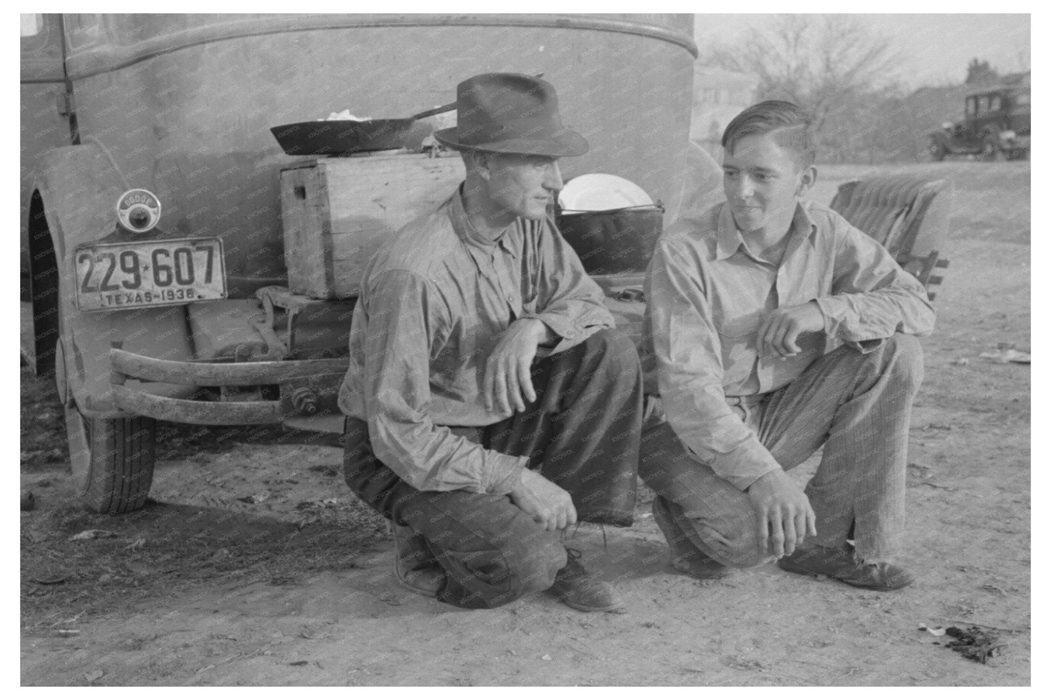 Migrant Father and Son in Edinburg Texas 1939 - Available at KNOWOL