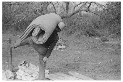 Migrant Worker Carrying Mattress in Harlingen Texas 1939 - Available at KNOWOL