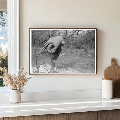 Migrant Worker Carrying Mattress in Harlingen Texas 1939 - Available at KNOWOL