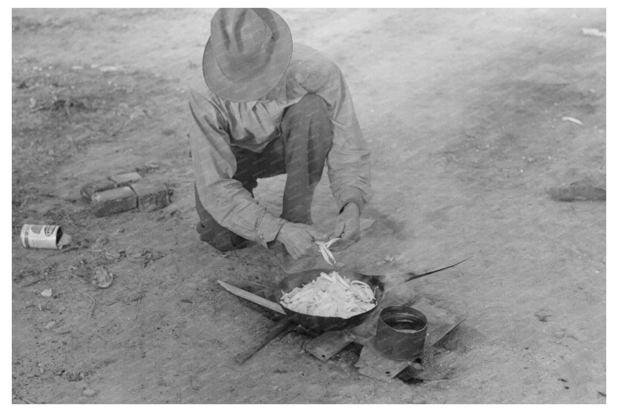 Migrant Worker Cooking Over Campfire Edinburg Texas 1939 - Available at KNOWOL