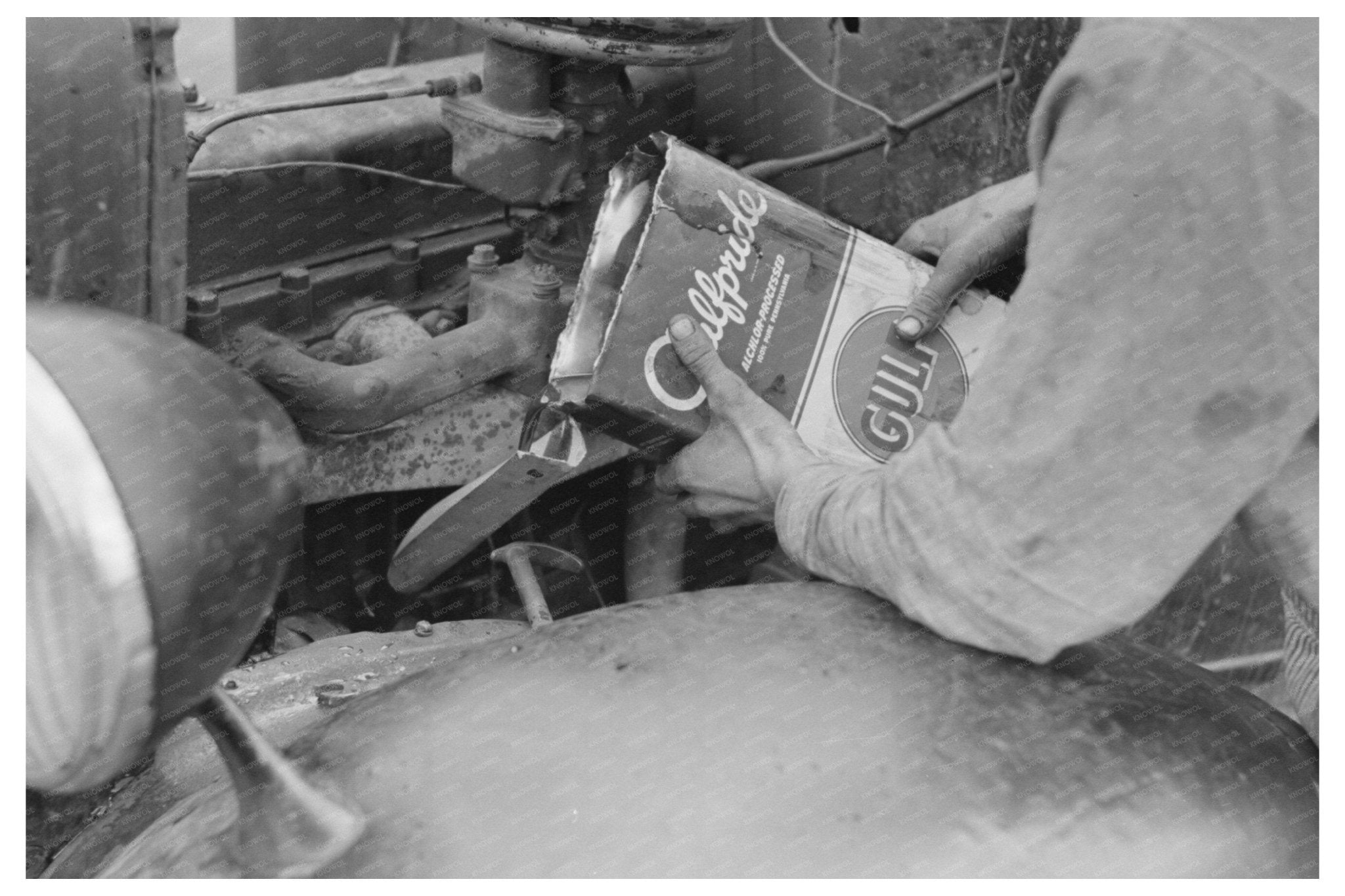 Migrant Worker Oil Change in Texas February 1939 - Available at KNOWOL