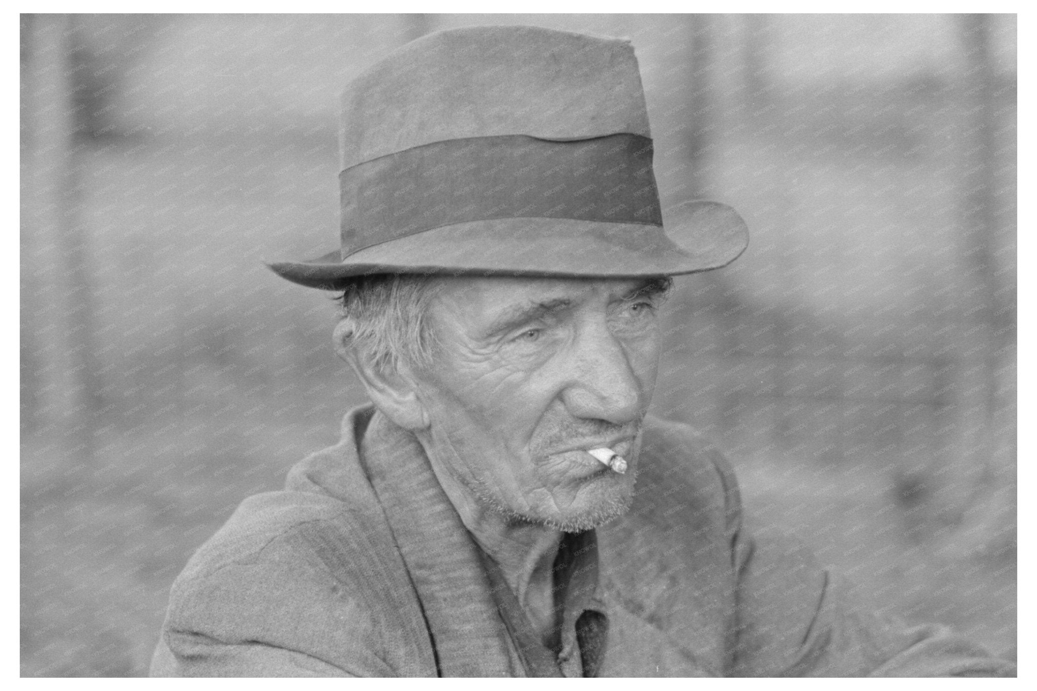 Migrant Worker Resting Roadside Hancock County 1938 - Available at KNOWOL