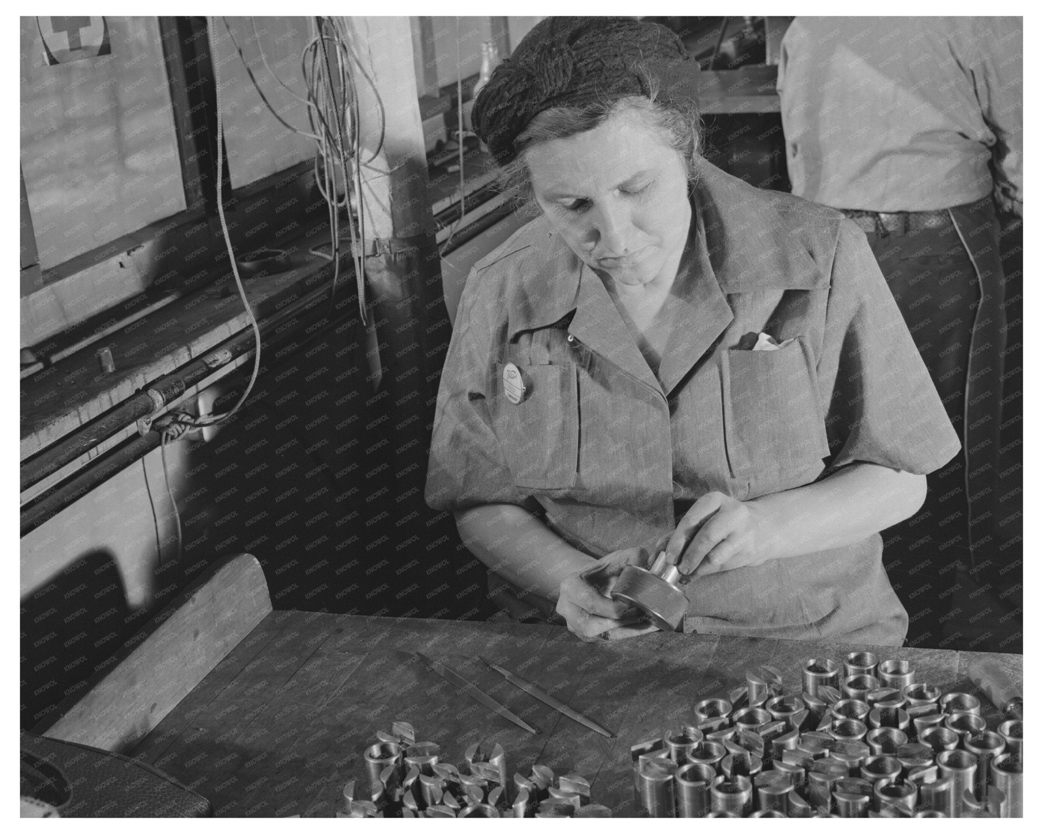 Milwaukee Woman Inspects Gun Parts February 1943 - Available at KNOWOL