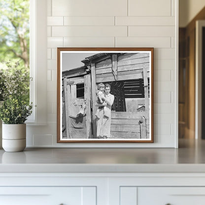 Mother and Child Outside Woodshed Gibbs City Michigan 1937 - Available at KNOWOL