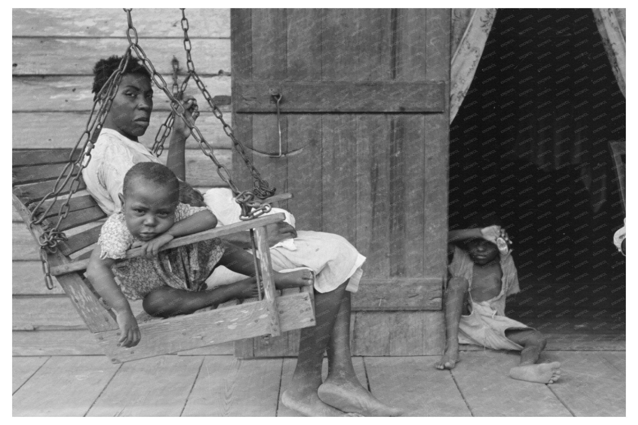 Mother and Children on Porch Paulina Louisiana 1938 - Available at KNOWOL