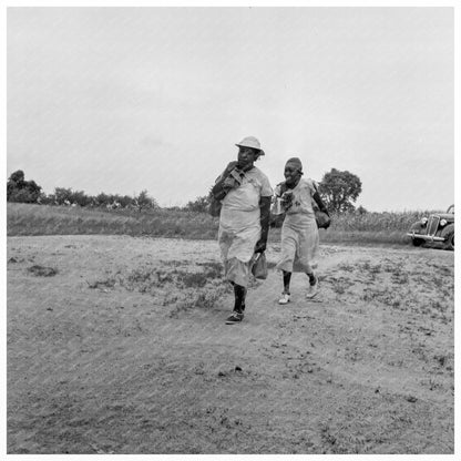 Mother and Friend Carrying Vegetables in North Carolina 1939 - Available at KNOWOL