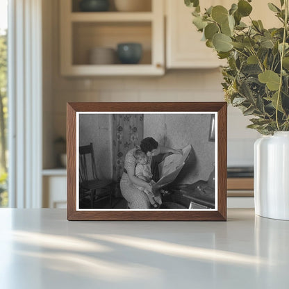 Mother Reading Newspaper with Child in Nissen Shack 1936 - Available at KNOWOL