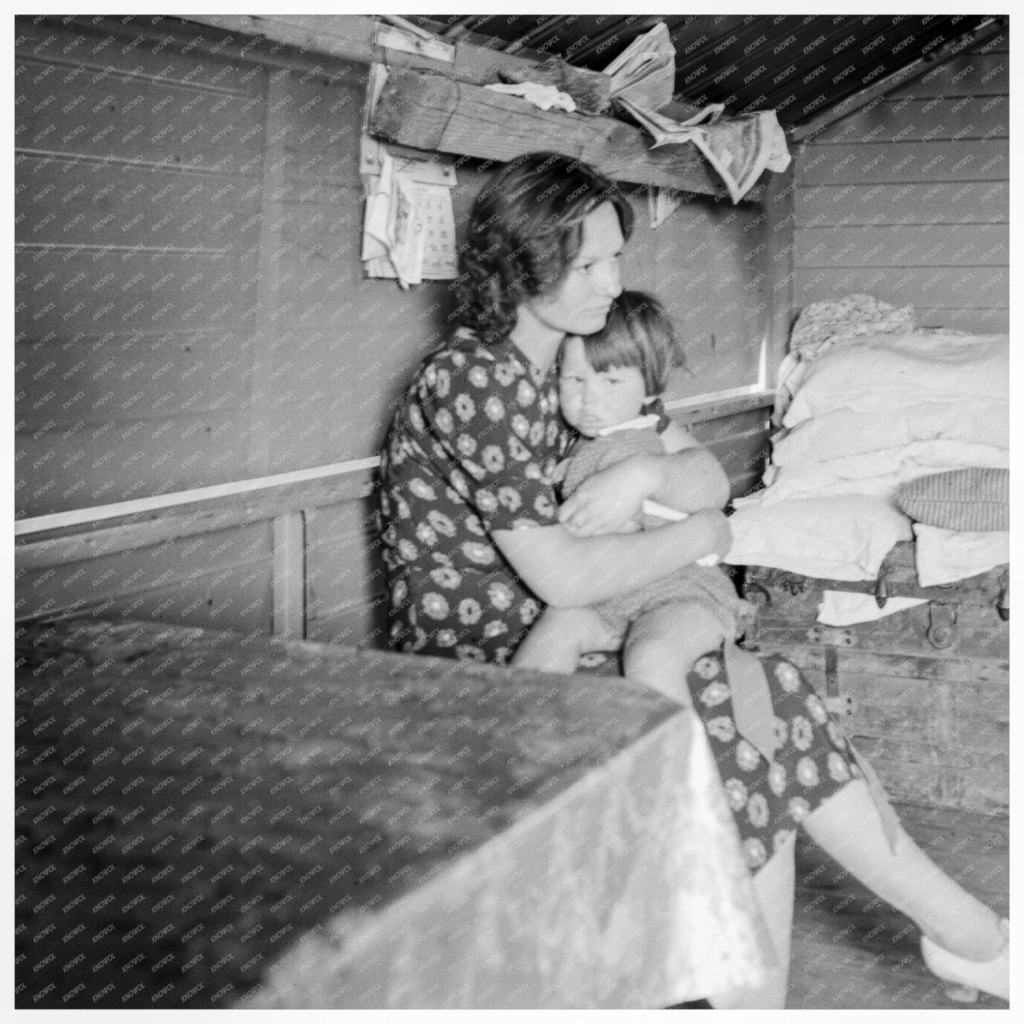 Mother with Sick Baby in FSA Camp Tulare County 1939 - Available at KNOWOL