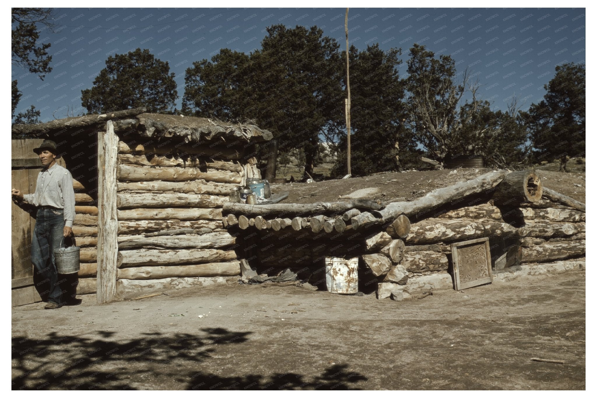 Mr. Leatherman Exiting Dugout Home Pie Town NM 1940 - Available at KNOWOL