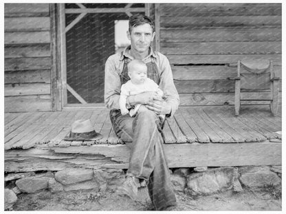 Mr. Whitfield Tobacco Sharecropper with Baby July 1939 - Available at KNOWOL