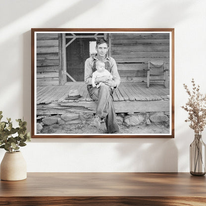 Mr. Whitfield Tobacco Sharecropper with Baby July 1939 - Available at KNOWOL