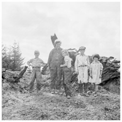 Mrs. Arnold and Children by Stump Pile Western Washington 1939 - Available at KNOWOL