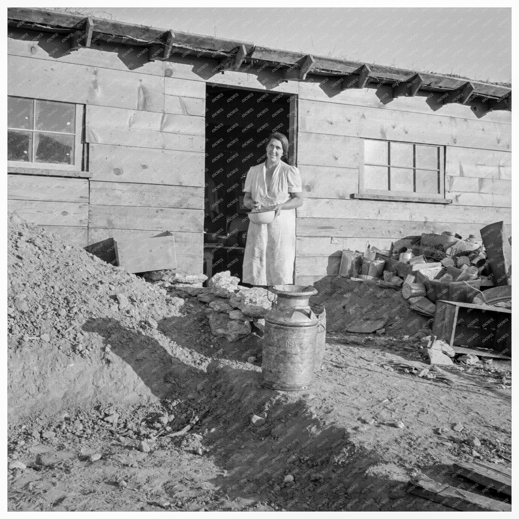 Mrs. Dougherty in Doorway of Basement House 1939 Oregon - Available at KNOWOL