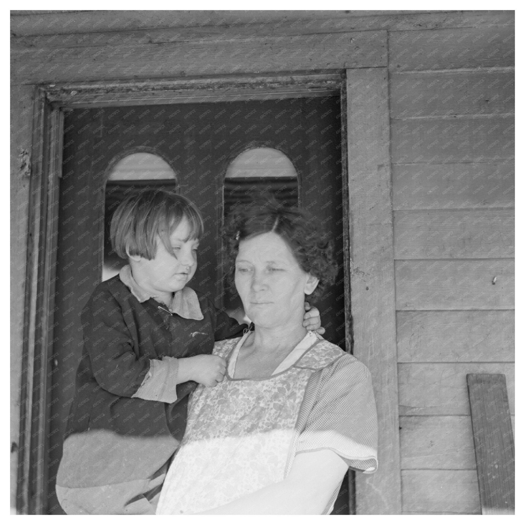 Mrs. Fred Morgenflash with Child on Farm January 1937 - Available at KNOWOL