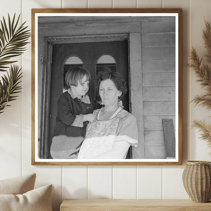 Mrs. Fred Morgenflash with Child on Farm January 1937 - Available at KNOWOL