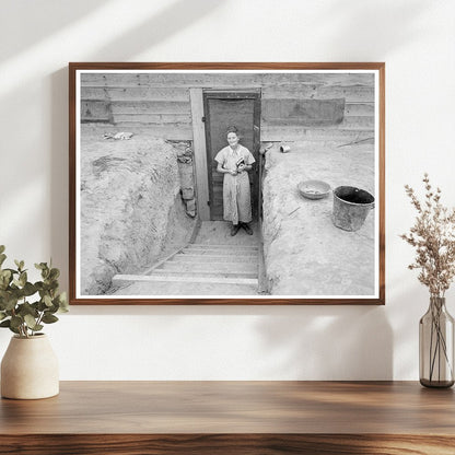 Mrs. Free in Doorway of Basement Dugout Home 1939 - Available at KNOWOL