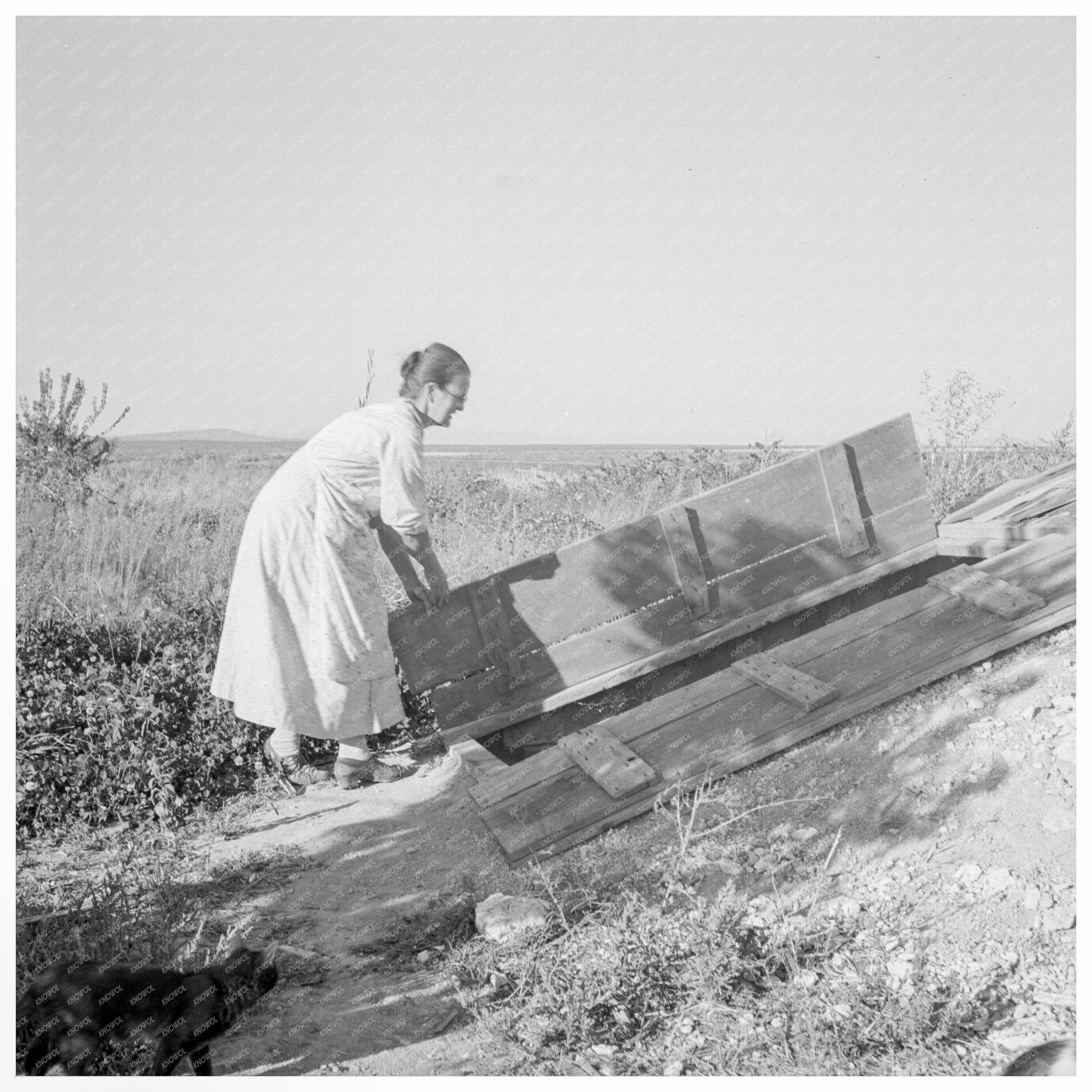 Mrs. Hull Closing Well - Stocked Cellar in Oregon 1939 - Available at KNOWOL