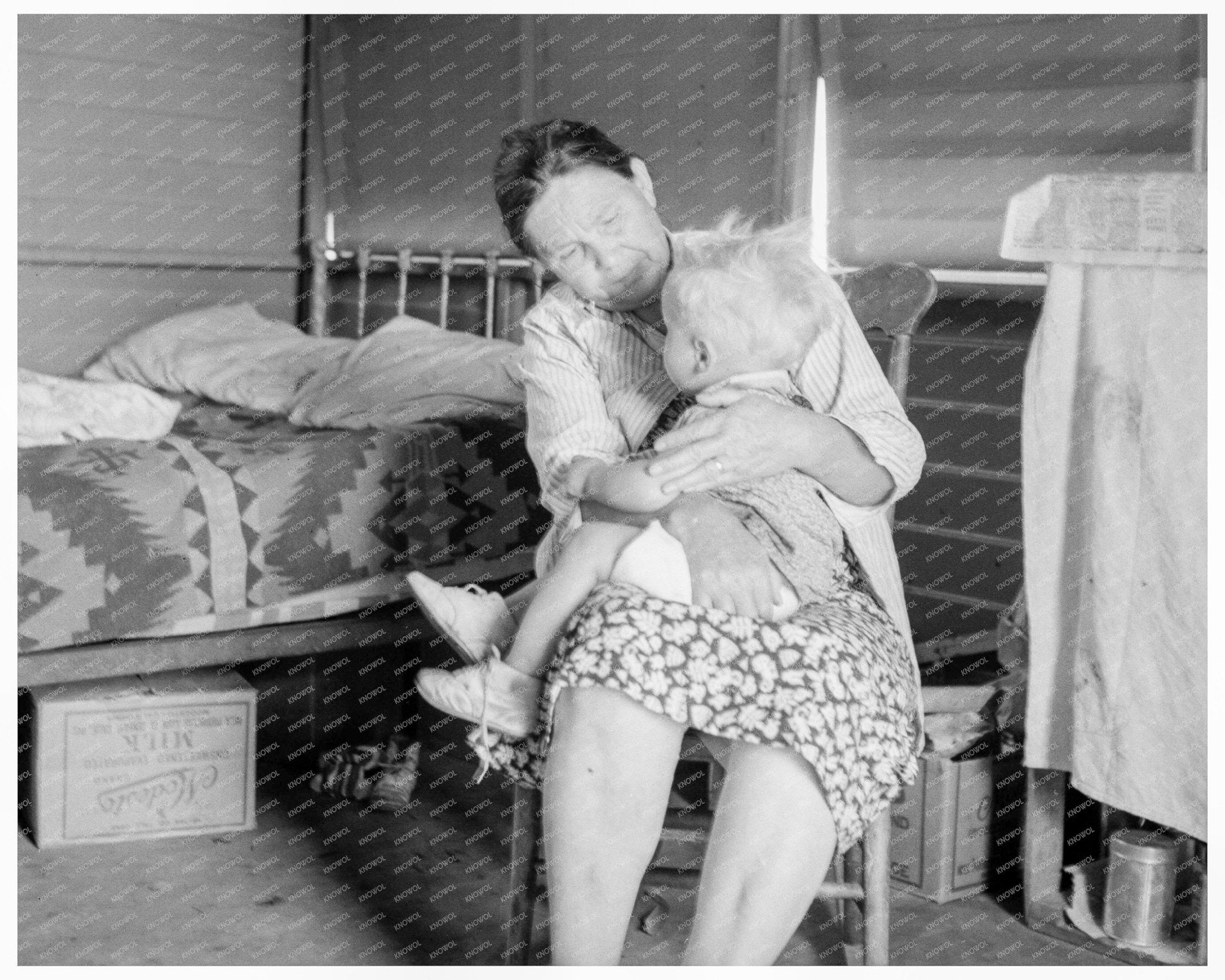 Oklahoma Mother Cares for Sick Baby in 1939 FSA Camp - Available at KNOWOL