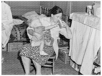 Oklahoma Woman Cares for Sick Baby in FSA Camp 1939 - Available at KNOWOL