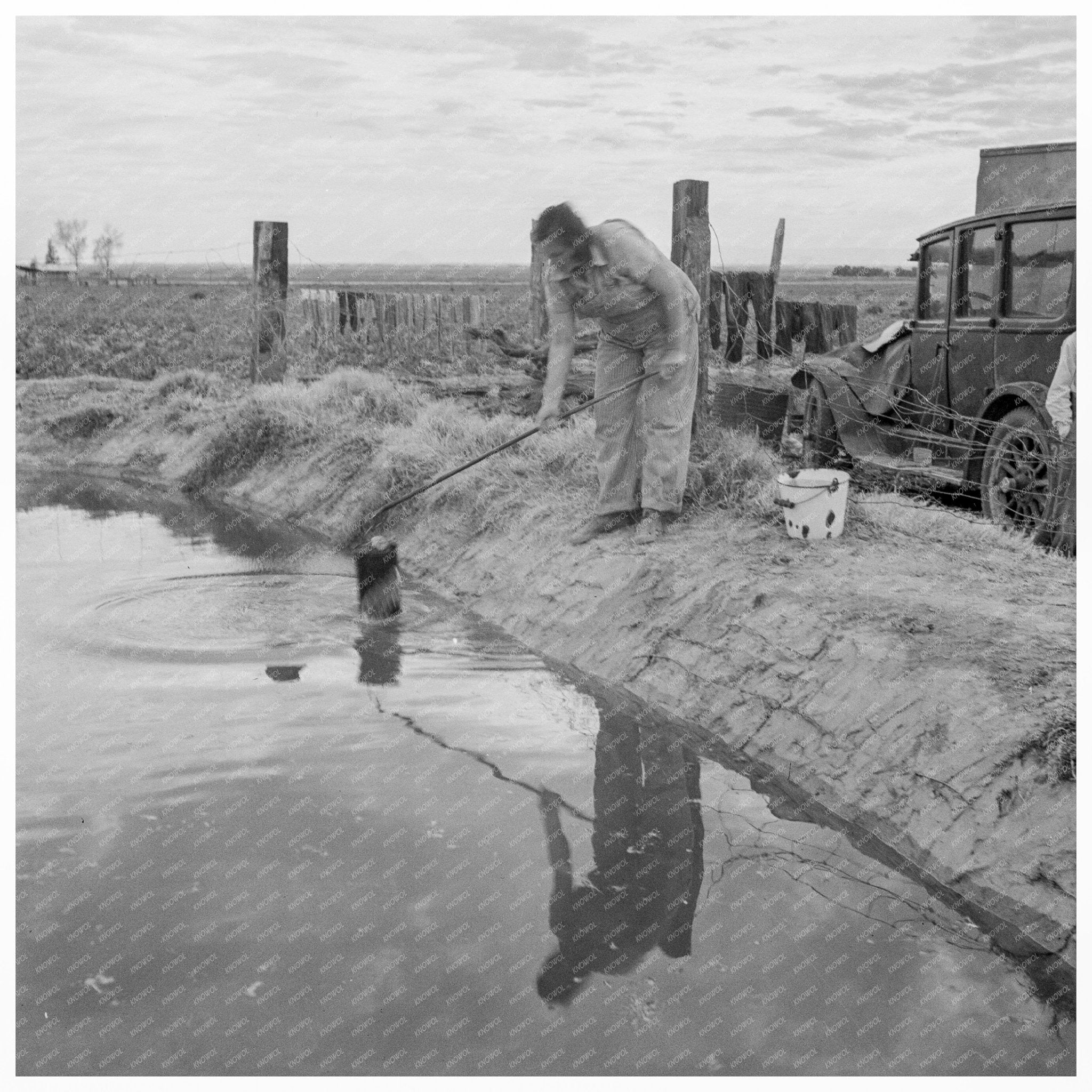 Open Settling Basin in Calipatria Squatter Camp 1937 - Available at KNOWOL