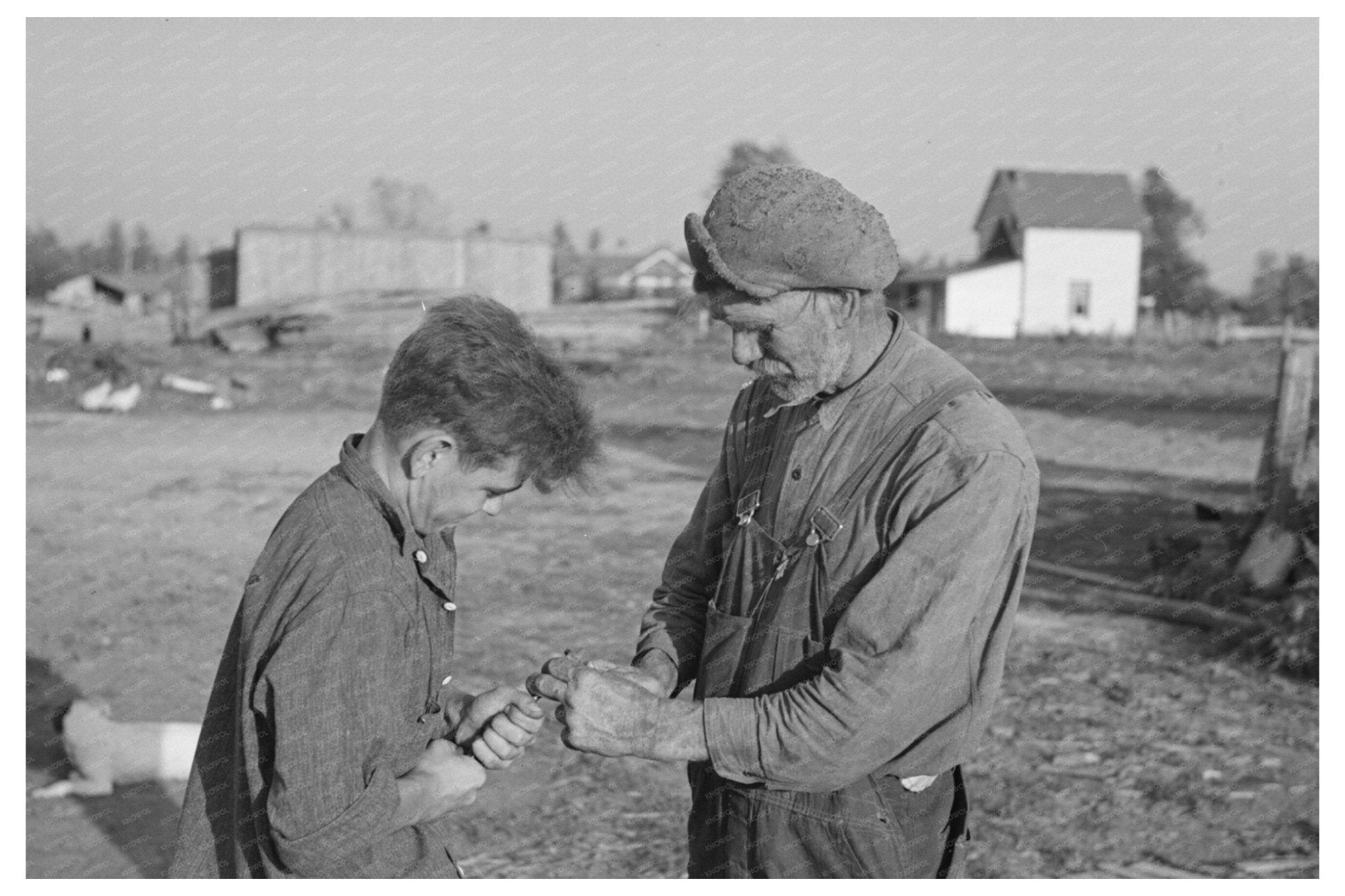 Pioneer Farmer and Hired Man on Minnesota Farm 1937 - Available at KNOWOL