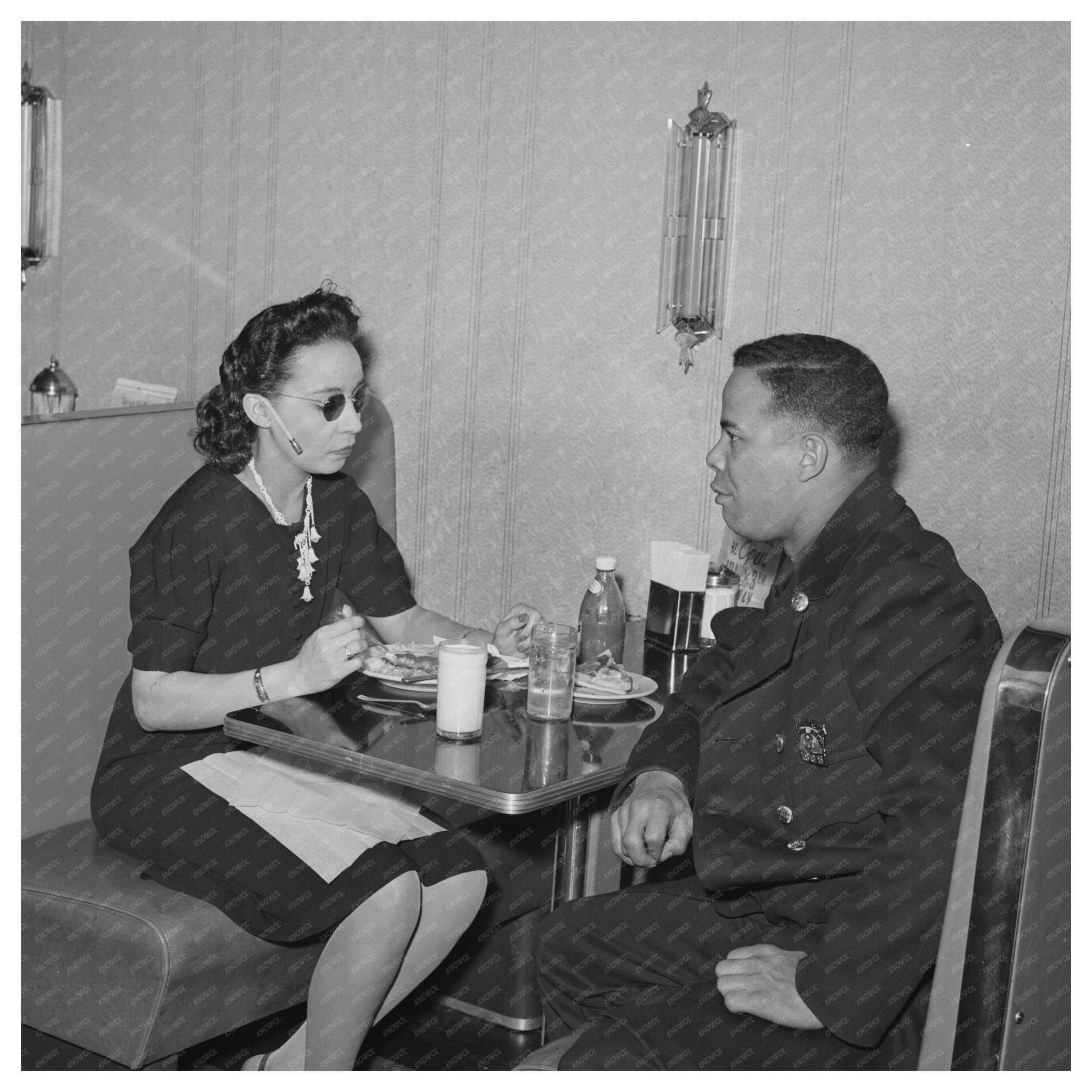 Policeman Talks to Employee at Chicago Ten - Cent Store 1941 - Available at KNOWOL