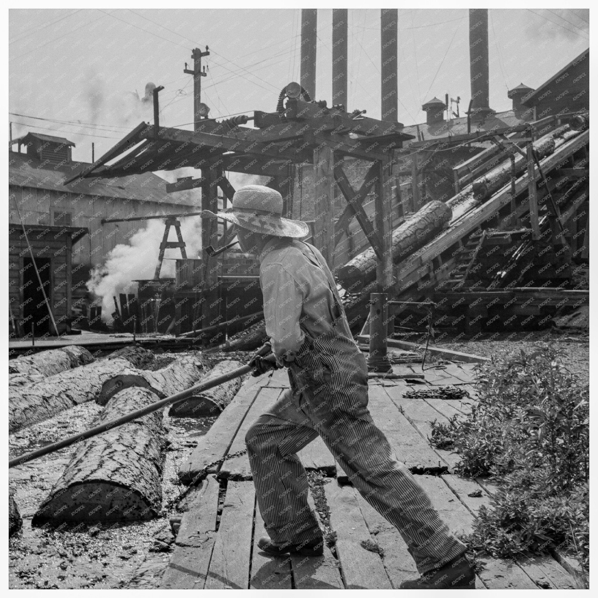 Pond Monkey Directing Logs at Pelican Bay 1939 - Available at KNOWOL