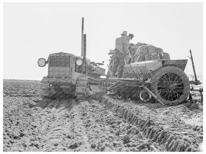 Potato Planter Loading Fertilizer and Seed 1939 - Available at KNOWOL