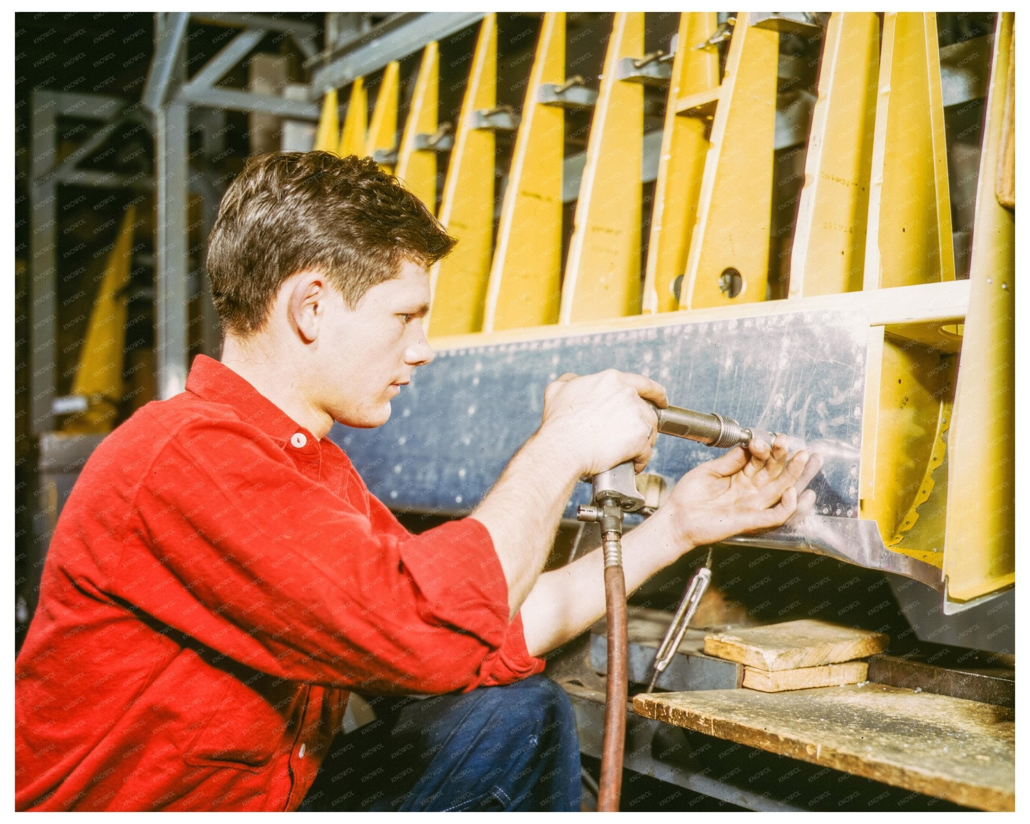 Riveter at Douglas Aircraft Plant Long Beach 1942 - Available at KNOWOL