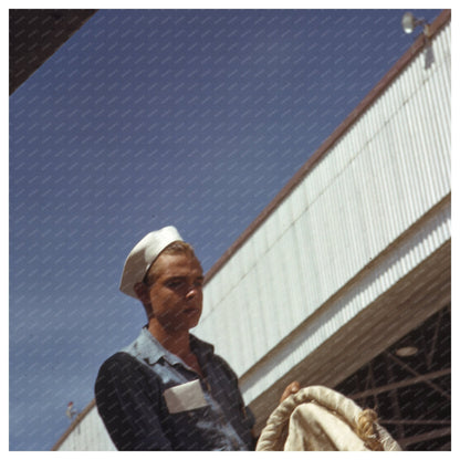 Sailor Mechanic Inspects PBY Plane Corpus Christi 1942 - Available at KNOWOL