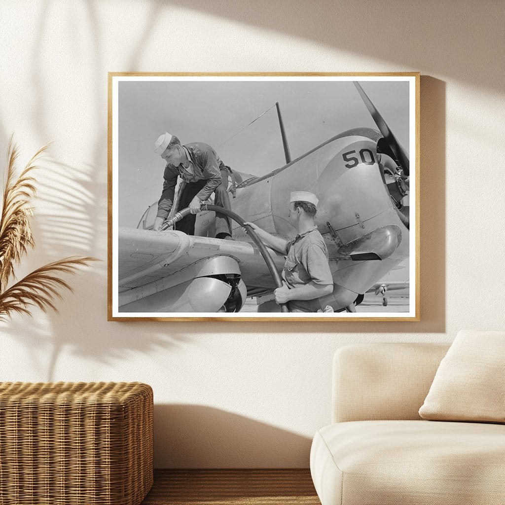 Sailor Mechanics Refueling SNC Plane in 1942 Texas - Available at KNOWOL