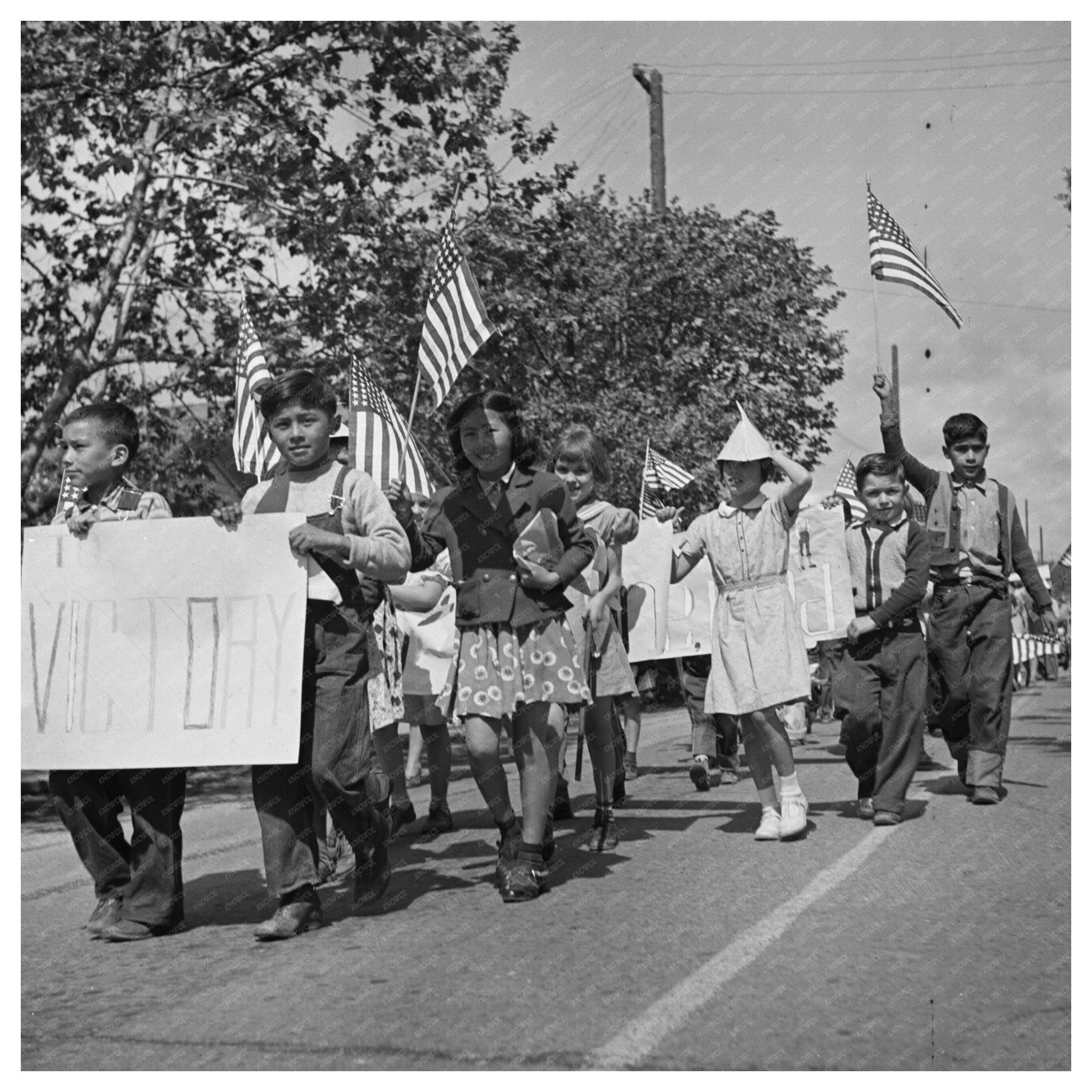 Schoolchildren Marching with Scrap Metal May 1942 - Available at KNOWOL