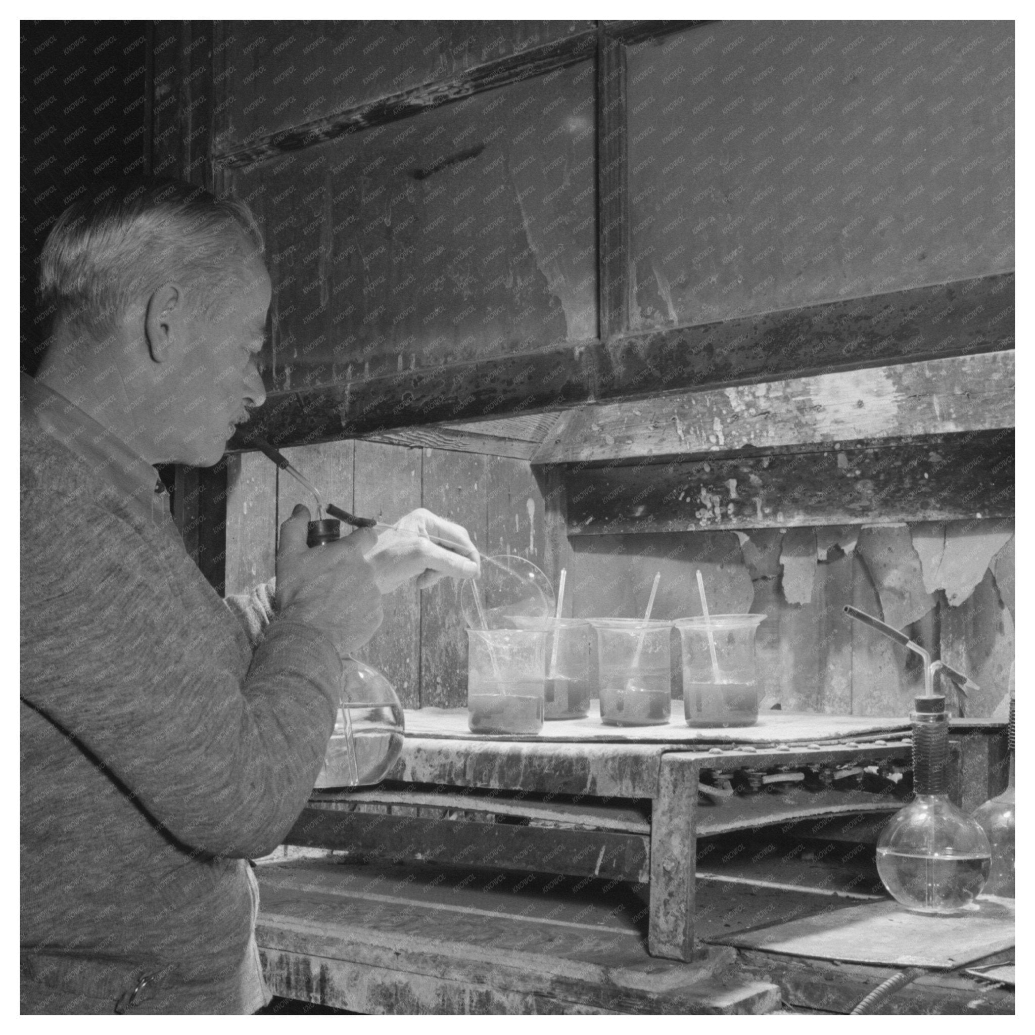 Scientist Analyzing Tungsten Ore in Arizona 1940 - Available at KNOWOL