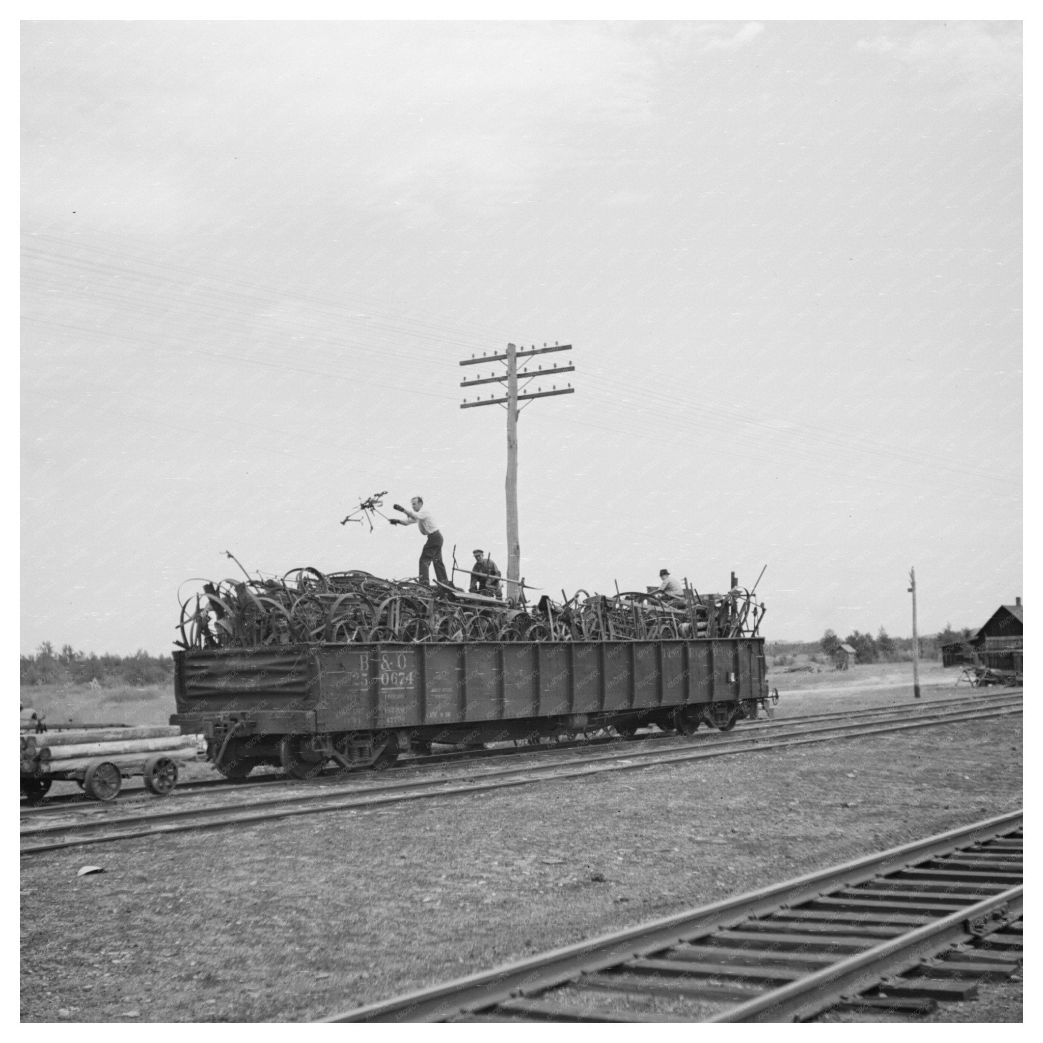 Scrap Iron Loading in Millville Wisconsin June 1937 - Available at KNOWOL