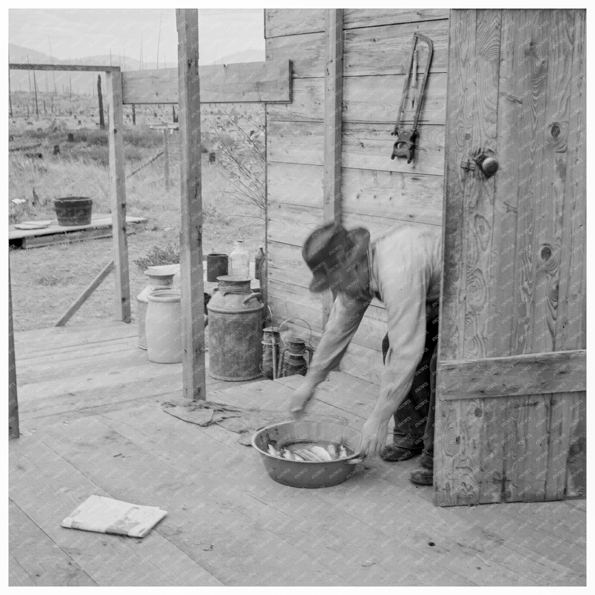 Settler with Caught Fish Priest River Valley Idaho 1939 - Available at KNOWOL