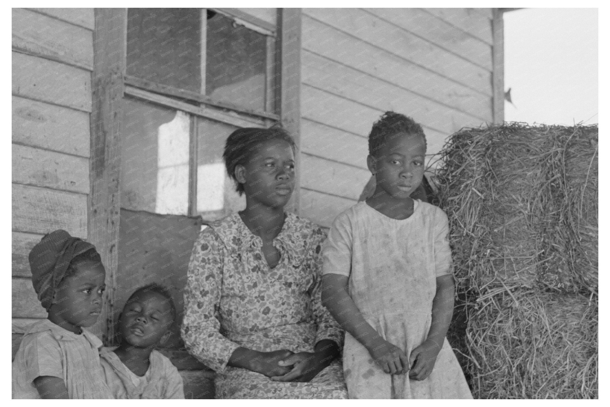 Sharecropper Family on Cabin Porch May 1938 Missouri - Available at KNOWOL