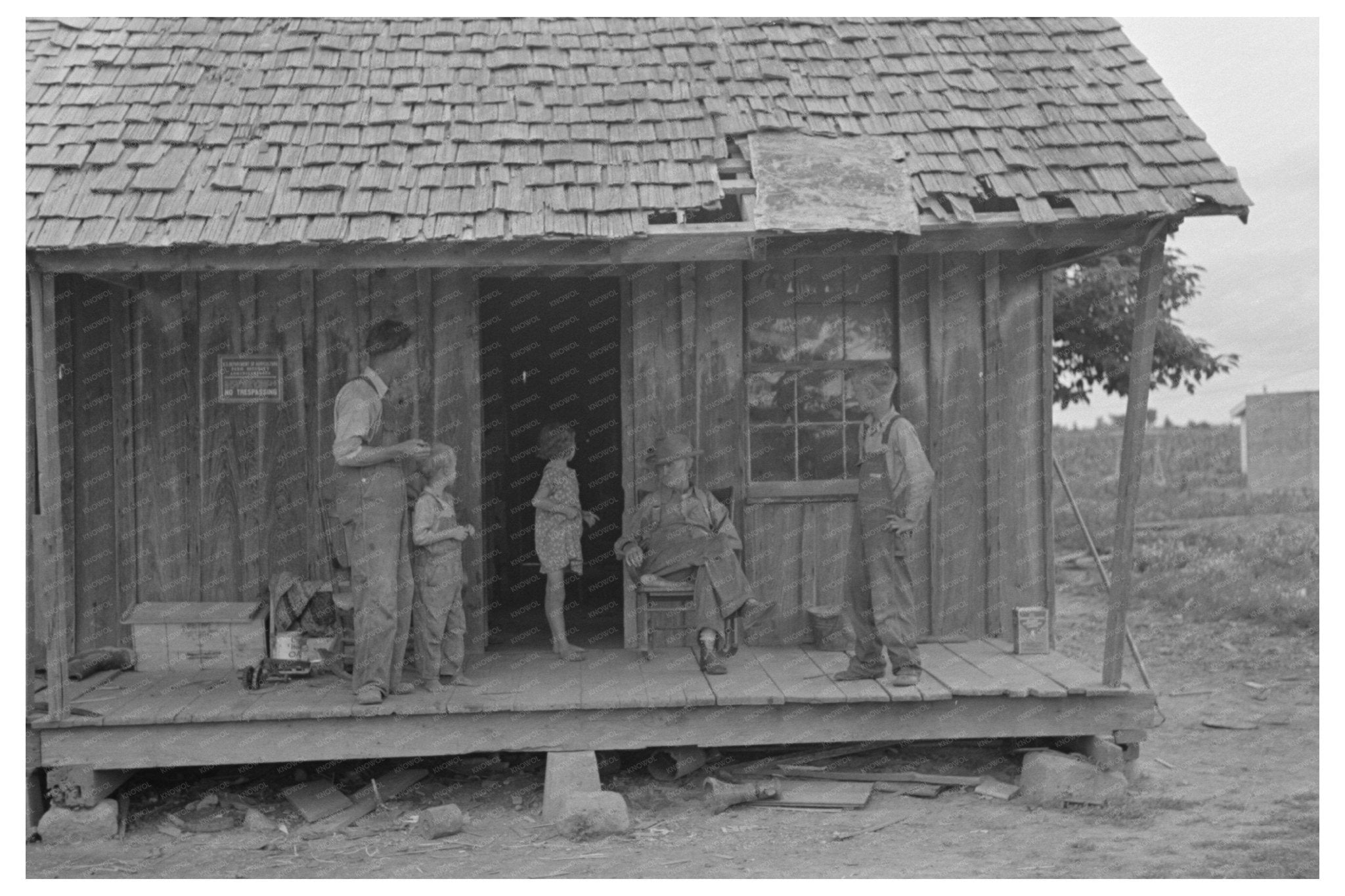 Sharecropper Family on Porch in New Madrid County 1938 - Available at KNOWOL