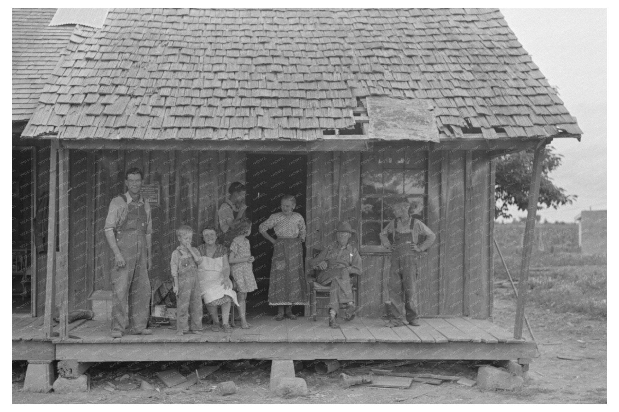 Sharecropper Family on Porch New Madrid County 1938 - Available at KNOWOL