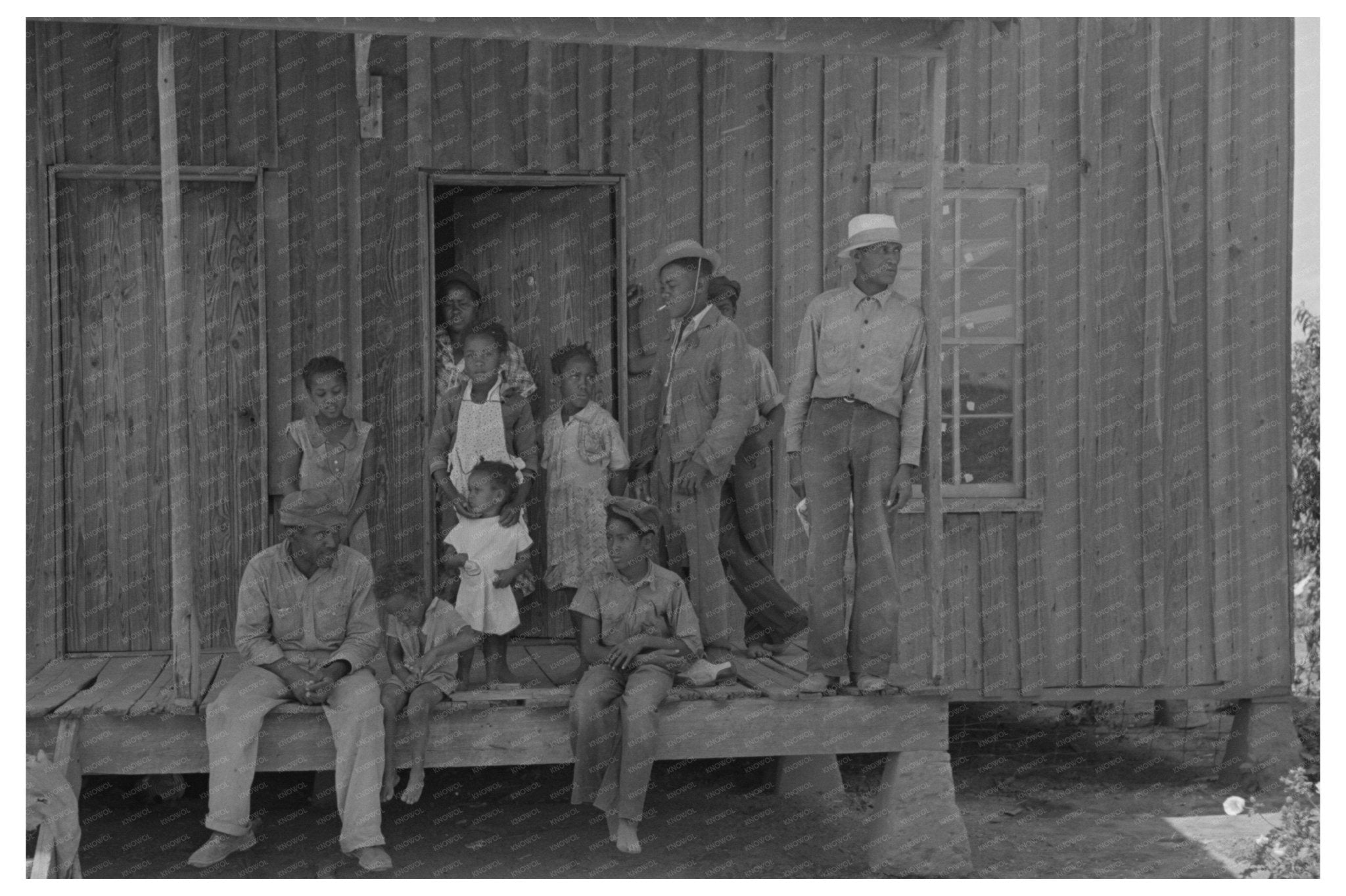 Sharecropper Family on Porch New Madrid Missouri 1938 - Available at KNOWOL