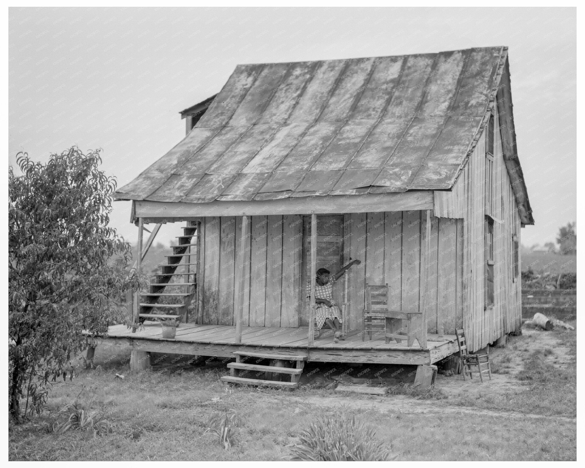 Sharecropper on Porch Blytheville Arkansas June 1937 - Available at KNOWOL