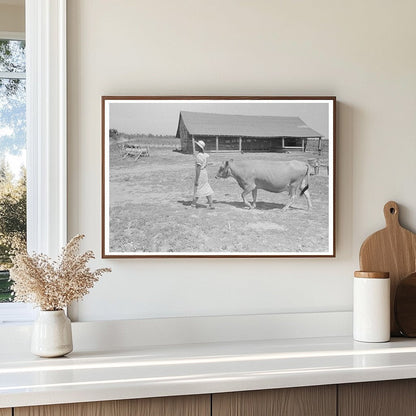 Sharecroppers Wife with Cow in New Madrid County 1938 - Available at KNOWOL