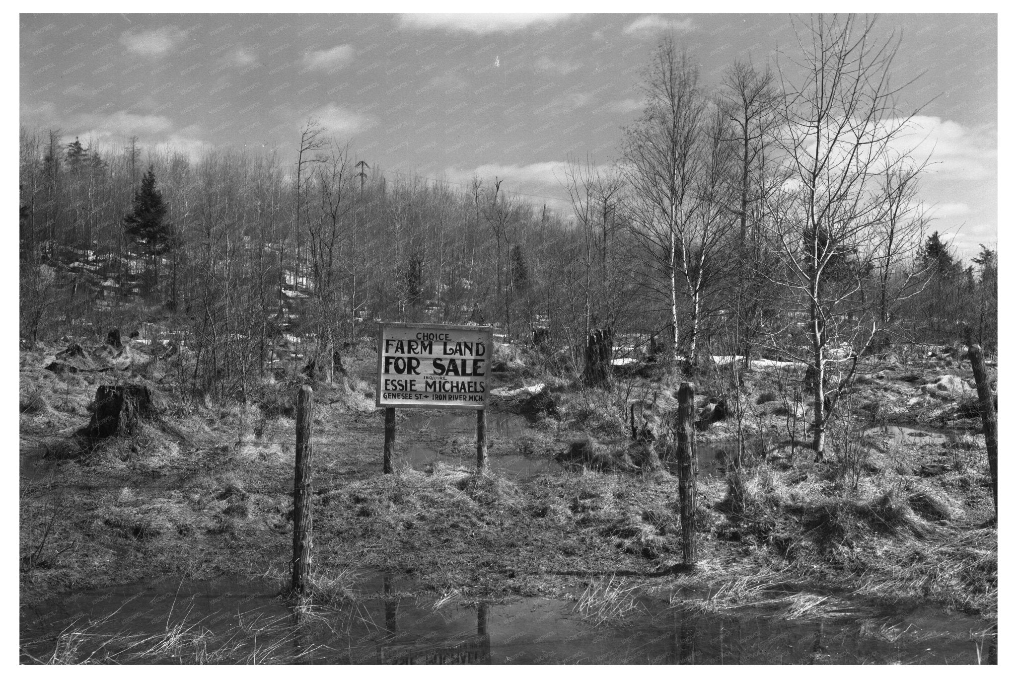 Signboard on Cut - Over Land Iron River Michigan 1937 - Available at KNOWOL