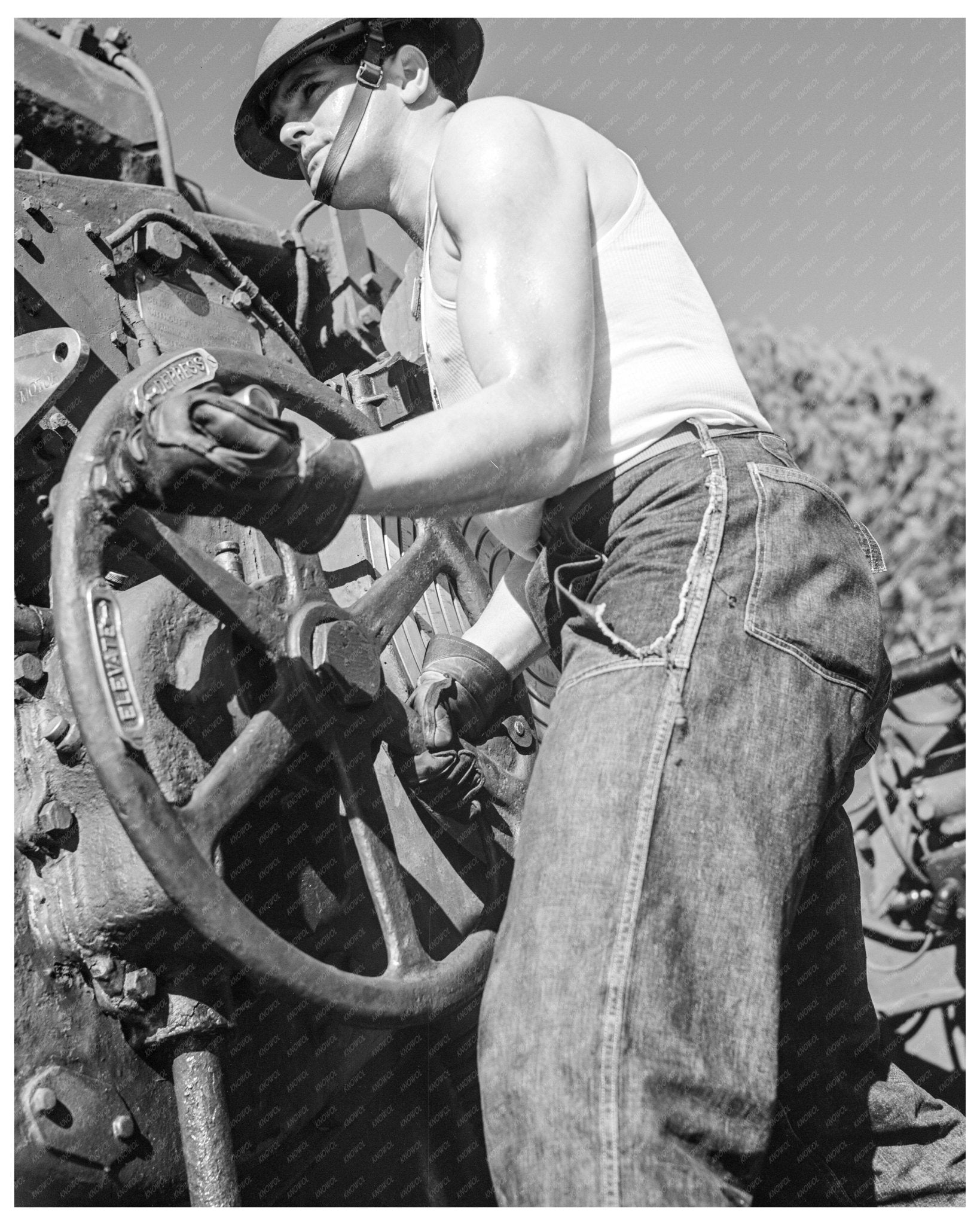 Soldier Adjusting Coastal Defense Gun at Fort Story Virginia March 1942 - Available at KNOWOL