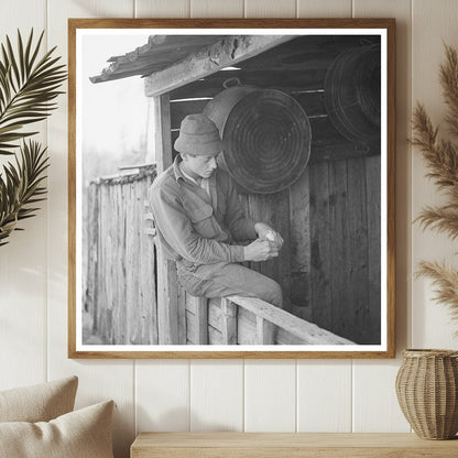 Son of William Shanard Rolling Cigarette in Rural Michigan 1937 - Available at KNOWOL