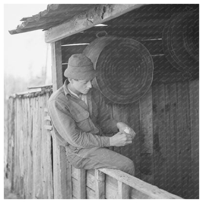 Son of William Shanard Rolling Cigarette in Rural Michigan 1937 - Available at KNOWOL