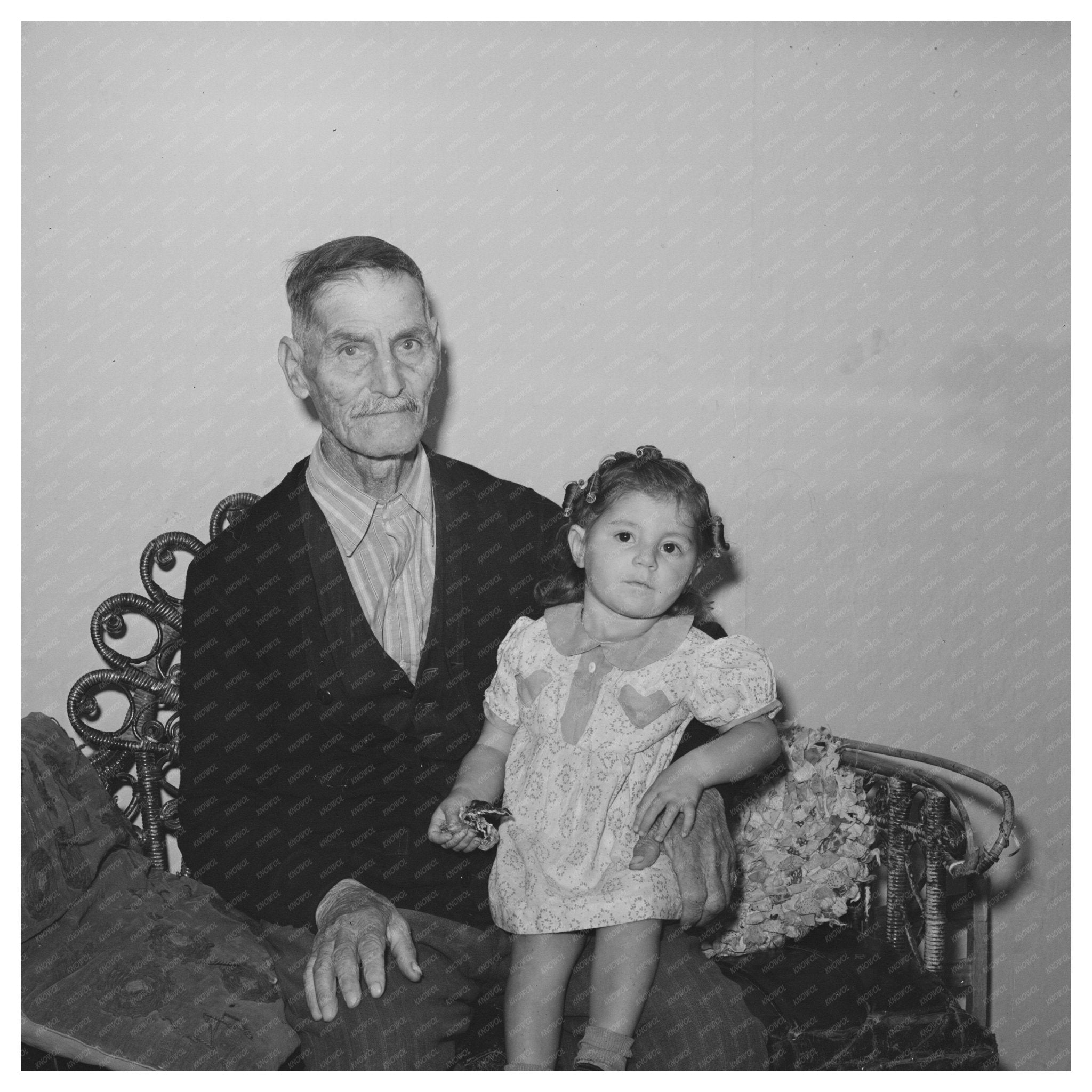 Spanish Man and Grandchild in Concho Arizona 1940 - Available at KNOWOL