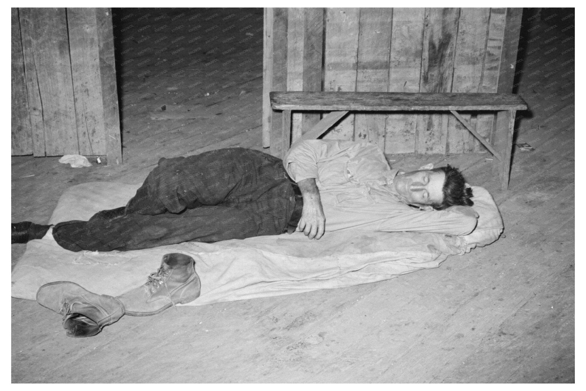 Squatters Resting in Warehouse Caruthersville Missouri 1938 - Available at KNOWOL